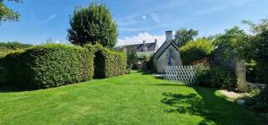 Appartements Charmant logement dans un ecrin de verdure : photos des chambres