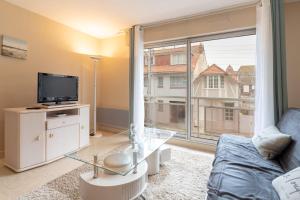 Appartements Agreable appartement avec place de parking : photos des chambres