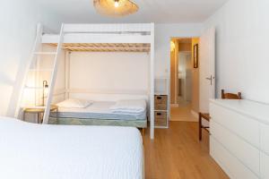 Appartements Agreable appartement avec place de parking : photos des chambres