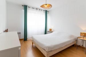 Appartements Agreable appartement avec place de parking : photos des chambres