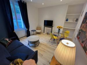 Appartements Maison des Fleurs T2 superbes a 10 min de ST et Soitec : photos des chambres