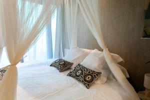 Appartements Bali Serenity Balneo et lit rond : photos des chambres