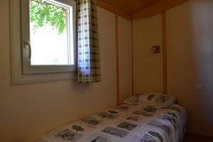 Campings Chalet grand confort : photos des chambres