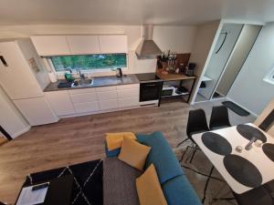 Northern living 2 room with shared bathroom