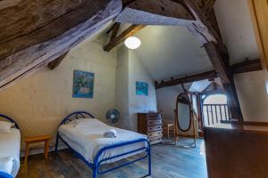 Maisons de vacances Le Petit Yogi, 5 minutes du ZooParc de Beauval : photos des chambres