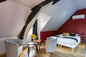 Appartements La Suite Rubis : photos des chambres