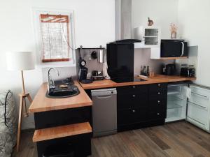 Appartements Les Amandiers : photos des chambres