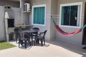 Casa a poucos metros da praia!