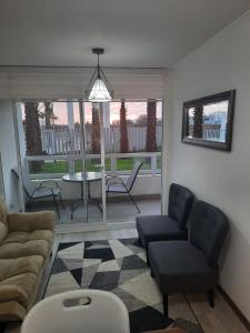 Acogedor Departamento Central con Piscina, Estacionamiento Privado y Más