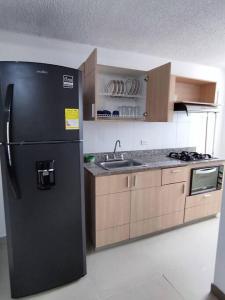 Apartamento con piscina, frente a CC Mayorca