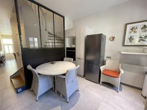 Appartements Le Petit Volnay : photos des chambres