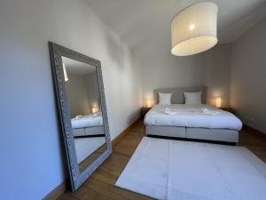 Appartements Le Petit Volnay : photos des chambres