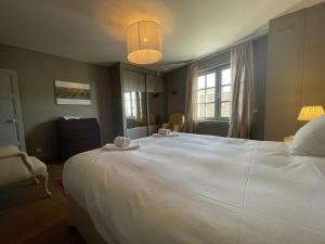 Appartements Le Petit Volnay : photos des chambres