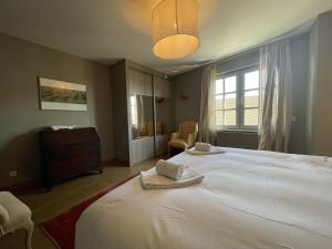 Appartements Le Petit Volnay - Au Coeur de Volnay : photos des chambres