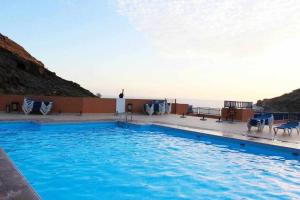 Apartamento con diseño moderno y piscina Taurito