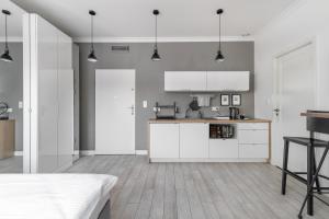 Kwiatowa Loft Apartment by BookingHost