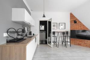 Kwiatowa Loft Apartment by BookingHost