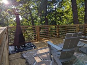 Cabin #6 with hot tub deck and sunset view at Loblolly Pines
