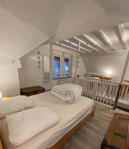 Maisons de vacances GERARDMER Gite Camomille Classe *** : photos des chambres