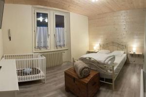 Maisons de vacances GERARDMER Gite Camomille Classe *** : photos des chambres