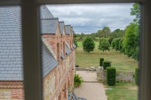 Maisons de vacances Le Domaine de Ravenoville - Pierres d'Histoire : photos des chambres