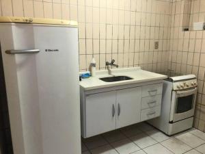 Aproveite a Praia Grande em uma casa agradável no Centro