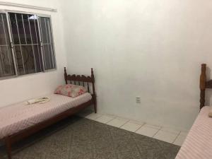 Aproveite a Praia Grande em uma casa agradável no Centro