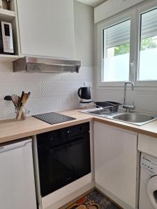 Appartements Bienvenue chez toi - TV, WiFi : photos des chambres