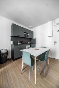 Residence Aristide Briand - Appartements en Centre Ville : photos des chambres