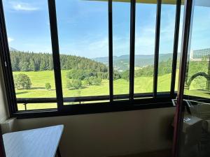 Studio cabine cosy, balcon sud, parking, Wi-Fi, près des pistes et randonnées - FR-1-515-183