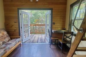 Waterfront Treehouse in a Magical Forest