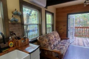 Waterfront Treehouse in a Magical Forest