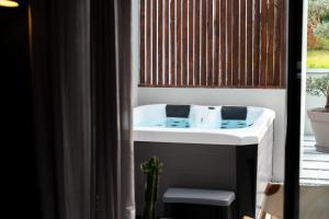 Maisons de vacances Yanna Lodge, cocon avec jacuzzi en Baie de Somme : photos des chambres