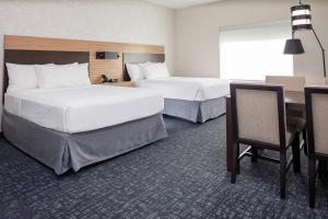 Deluxe Queen Studio with Two Queen Beds room in TownePlace Suites by Marriott Orlando Airport