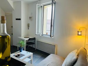 Appartements Cosy Studio hyper centre avec kitchenette et Clim : photos des chambres