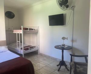 Pousada Casa de mãe aconchegante com piscina próximo à praia