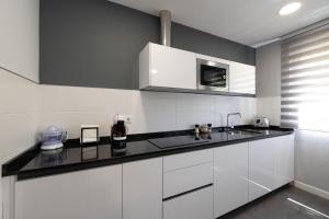 ALQUILAZ. Apartamentos Turísticos.