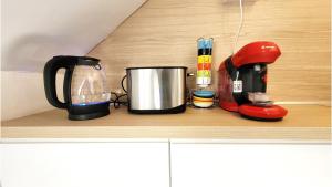 Appartements Sous les toits – tout confort : photos des chambres