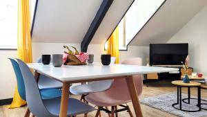 Appartements Sous les toits – tout confort : photos des chambres