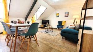 Appartements Sous les toits – tout confort : photos des chambres