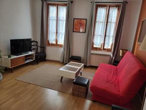 Appartements Logements A 2 PETITS PAS : photos des chambres