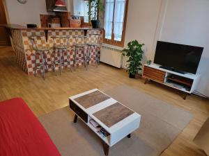 Appartements Logements A 2 PETITS PAS : photos des chambres