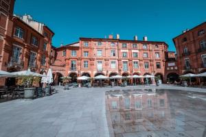 Appartements une pause sur la place Royale : photos des chambres