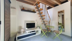 Appartements Le 30 - Duplex en rez-de-jardin proche du centre : photos des chambres