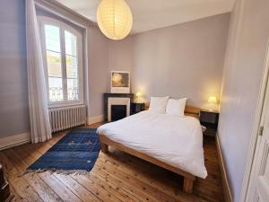 Appartements Le Bienheureux, le calme en ville et jardin : photos des chambres