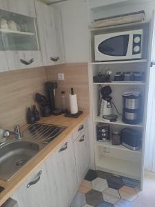 Appartements Bienvenue chez nous : photos des chambres