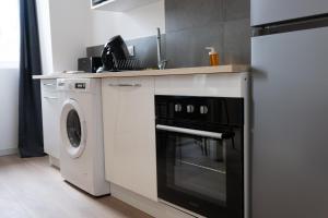 Appartements Le Moonlight 204 - Machine a laver - Places gratuites : photos des chambres