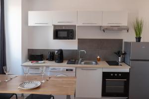 Appartements Le Moonlight 204 - Machine a laver - Places gratuites : Appartement 1 Chambre