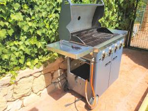 Apartamento con hermoso jardín y AC