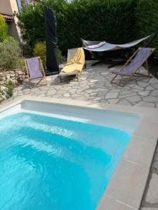 Villas Villa bleue - piscine * climatisation * Wifi * vue dominante : photos des chambres